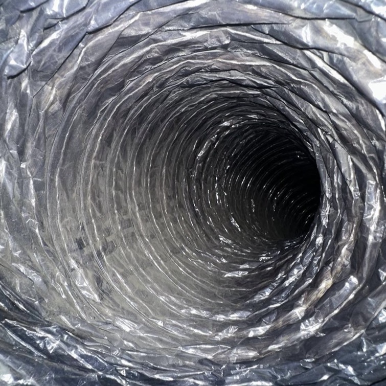 Air duct cleaning inspection photo showing dust and buildup